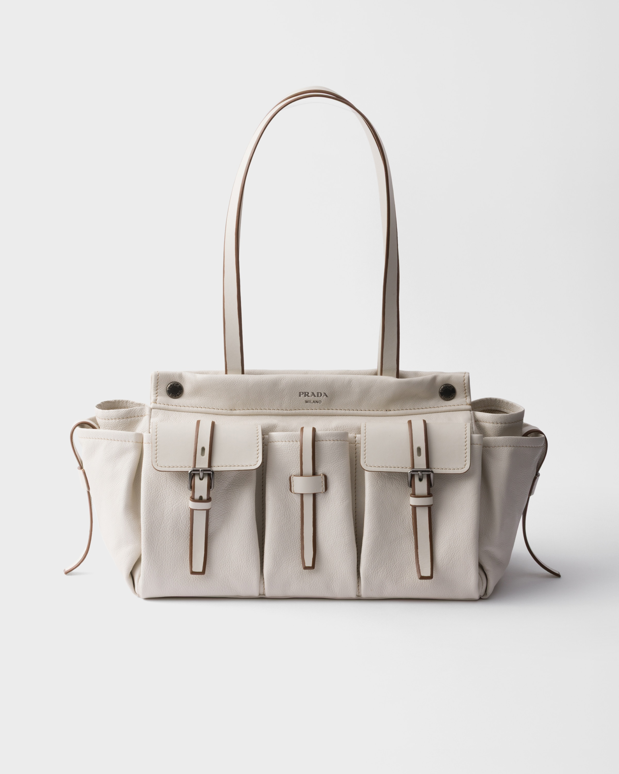 Prada Route Large Leather Tote Bag in Chalk White calfskin with front and side strap-closure pockets.
