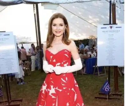 Guest in a red gown at a New York gala